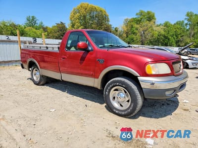 Czwarte zdjęcie samochodu z boku: 2001 FORD F150 VIN:1FTRF18L11NB46258 - miniatura
