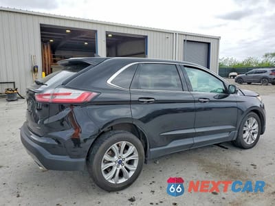 Trzecie zdjęcie samochodu z tyłu: 2022 FORD EDGE TITANIUM VIN:2FMPK4K92NBA38357 - miniatura