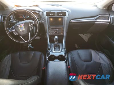 Zdjęcie 8 z 12 samochodu: 2016 FORD FUSION TITANIUM PHEV VIN:3FA6P0SU2GR241693 - miniatura