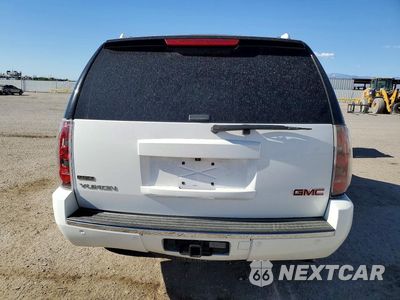 Zdjęcie 6 z 14 samochodu: 2011 GMC YUKON DENALI VIN:1GKS1EEF1BR399777 - miniatura