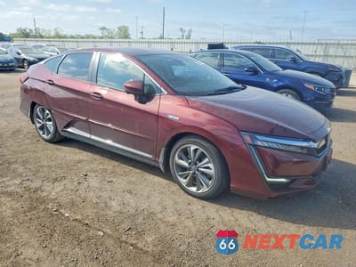 Czwarte zdjęcie samochodu z boku: 2018 HONDA CLARITY TOURING VIN:JHMZC5F3XJC017657 - miniatura