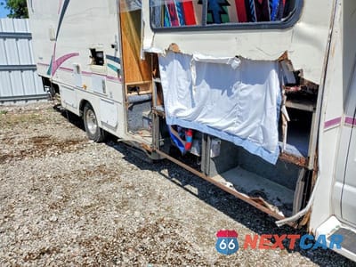 Zdjęcie 9 z 10 samochodu: 1999 FORD ECONOLINE E450 SUPER DUTY CUTAWAY VAN RV VIN:1FDXE40SXXHB08478 - miniatura