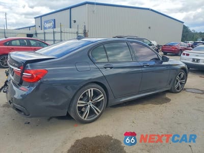 Trzecie zdjęcie samochodu z tyłu: 2018 BMW 750 XI VIN:WBA7B0C57JG527278 - miniatura