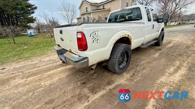 Czwarte zdjęcie samochodu z boku: 2015 FORD F250 SUPER DUTY VIN:1FT7X2B63FED19427 - miniatura