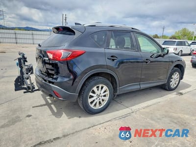 Trzecie zdjęcie samochodu z tyłu: 2015 MAZDA CX-5 TOURING VIN:JM3KE4CYXF0474833 - miniatura