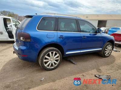 Trzecie zdjęcie samochodu z tyłu: 2010 VOLKSWAGEN TOUAREG V6 VIN:WVGBF7A96AD003276 - miniatura