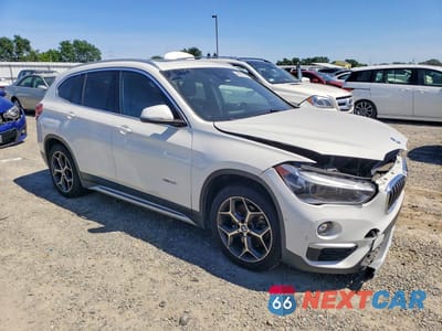 Czwarte zdjęcie samochodu z boku: 2016 BMW X1 XDRIVE28I VIN:WBXHT3Z38G4A51831 - miniatura
