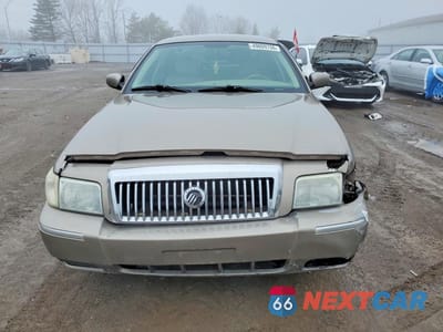 Piąte zdjęcie samochodu w środku: 2006 MERCURY GRAND MARQUIS LS VIN:2MEFM75V56X650625 - miniatura