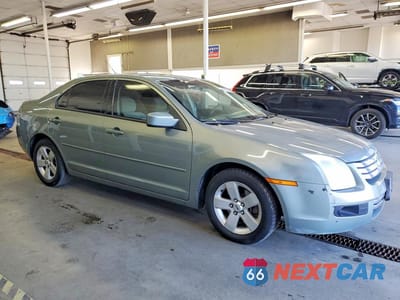 Czwarte zdjęcie samochodu z boku: 2008 FORD FUSION SE VIN:3FAHP07108R220155 - miniatura