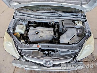 Zdjęcie 12 z 14 samochodu: 2010 MAZDA 5 SPORT VIN:JM1CR2W30A0372441 - miniatura