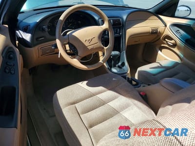 Zdjęcie 8 z 11 samochodu: 1998 FORD MUSTANG VIN:1FAFP4040WF186523 - miniatura