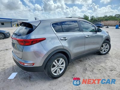 Trzecie zdjęcie samochodu z tyłu: 2019 KIA SPORTAGE LX VIN:KNDPMCAC2K7591875 - miniatura