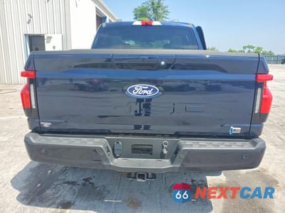 Zdjęcie 6 z 12 samochodu: 2024 FORD F150 LIGHTNING XLT VIN:1FTVW3L72RWG23113 - miniatura