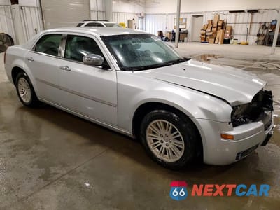 Czwarte zdjęcie samochodu z boku: 2010 CHRYSLER 300 TOURING VIN:2C3CA5CV0AH327501 - miniatura
