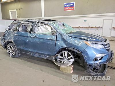 Czwarte zdjęcie samochodu z boku: 2017 HONDA PILOT ELITE VIN:5FNYF6H04HB079811 - miniatura