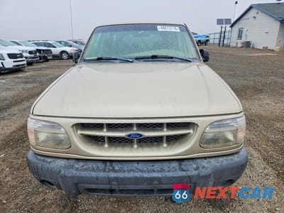 Piąte zdjęcie samochodu w środku: 1999 FORD EXPLORER VIN:1FMZU34X8XUA27210 - miniatura