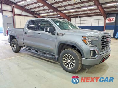 Czwarte zdjęcie samochodu z boku: 2020 GMC SIERRA K1500 AT4 VIN:1GTU9EETXLZ375868 - miniatura