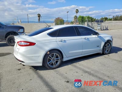 Trzecie zdjęcie samochodu z tyłu: 2016 FORD FUSION TITANIUM PHEV VIN:3FA6P0SU2GR241693 - miniatura