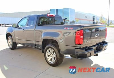 Czwarte zdjęcie samochodu z boku: 2017 CHEVROLET COLORADO LT VIN:1GCHTCENXH1238573 - miniatura