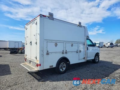 Trzecie zdjęcie samochodu z tyłu: 2014 GMC SAVANA UTILITY / SERVICE TRUCK VIN:1GD072BG1E1152464 - miniatura