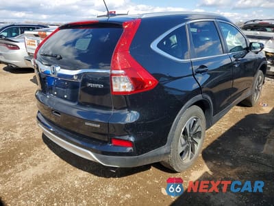 Trzecie zdjęcie samochodu z tyłu: 2016 HONDA CR-V TOURING VIN:5J6RM4H98GL040237 - miniatura