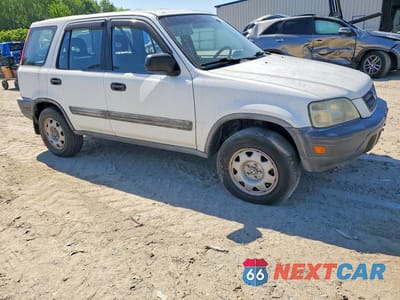Czwarte zdjęcie samochodu z boku: 1999 HONDA CR-V VIN:JHLRD2846XC016424 - miniatura