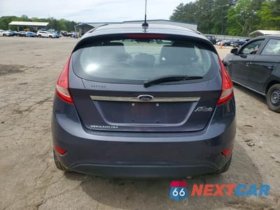 Zdjęcie 6 z 11 samochodu: 2013 FORD FIESTA TITANIUM VIN:3FADP4FJ3DM173380 - miniatura