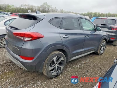 Trzecie zdjęcie samochodu z tyłu: 2018 HYUNDAI TUCSON LIMITED VIN:KM8J3CA21JU820770 - miniatura