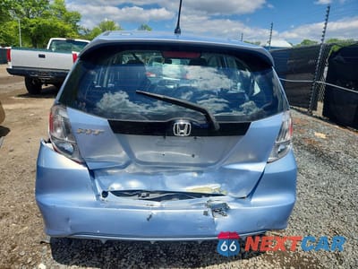 Zdjęcie 6 z 12 samochodu: 2009 HONDA FIT SPORT VIN:JHMGE88479S041733 - miniatura