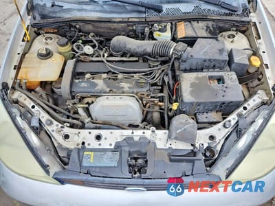 Zdjęcie 11 z 12 samochodu: 2002 FORD FOCUS ZX5 VIN:3FAHP373X2R192018 - miniatura
