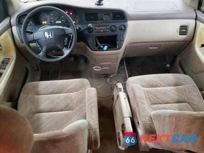 Zdjęcie 8 z 14 samochodu: 2002 HONDA ODYSSEY EX VIN:2HKRL18612H578191 - miniatura