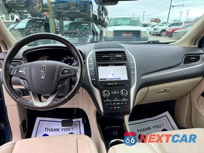Zdjęcie 9 z 10 samochodu: 2018 LINCOLN MKC RESERVE VIN:5LMCJ3D94JUL14242 - miniatura