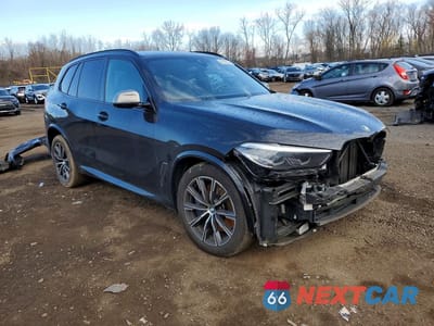 Czwarte zdjęcie samochodu z boku: 2022 BMW X5 M50I VIN:5UXJU4C01N9M89165 - miniatura