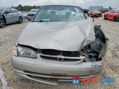 Piąte zdjęcie samochodu w środku: 1999 TOYOTA COROLLA VE VIN:1NXBR12E9XZ295109 - miniatura
