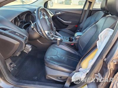 Zdjęcie 7 z 13 samochodu: 2014 FORD FOCUS TITANIUM VIN:1FADP3J23EL224714 - miniatura