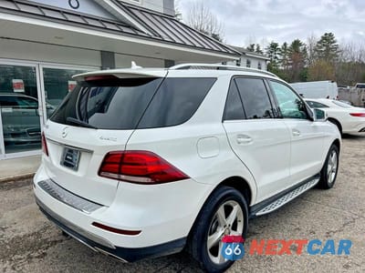 Czwarte zdjęcie samochodu z boku: 2016 MERCEDES-BENZ GLE 350 4MATIC VIN:4JGDA5HBXGA619920 - miniatura