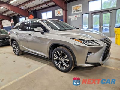 Czwarte zdjęcie samochodu z boku: 2019 LEXUS RX 350 BASE VIN:2T2ZZMCA0KC139011 - miniatura
