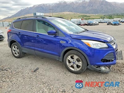 Czwarte zdjęcie samochodu z boku: 2013 FORD ESCAPE SE VIN:1FMCU9G91DUD57787 - miniatura