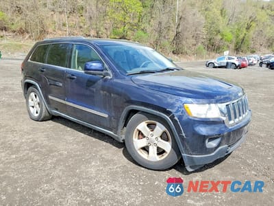 Czwarte zdjęcie samochodu z boku: 2011 JEEP GRAND CHEROKEE LAREDO VIN:1J4RR4GT7BC516730 - miniatura