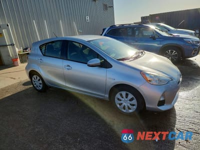 Czwarte zdjęcie samochodu z boku: 2012 TOYOTA PRIUS C TWO VIN:JTDKDTB39C1016878 - miniatura