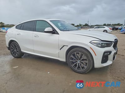 Czwarte zdjęcie samochodu z boku: 2020 BMW X6 XDRIVE40I VIN:5UXCY6C09L9C54702 - miniatura