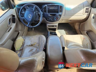 Zdjęcie 8 z 12 samochodu: 2002 MAZDA TRIBUTE LX VIN:4F2YU08142KM07136 - miniatura