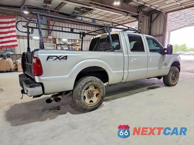 Trzecie zdjęcie samochodu z tyłu: 2014 FORD F250 SUPER DUTY VIN:1FT7W2BT8EEB84002 - miniatura