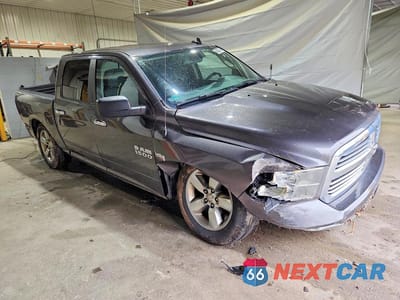 Czwarte zdjęcie samochodu z boku: 2015 RAM 1500 SLT VIN:3C6RR7LTXFG597200 - miniatura