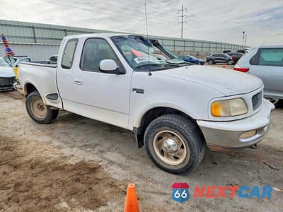 Czwarte zdjęcie samochodu z boku: 1997 FORD F150 VIN:1FTEX08L0VKC72396 - miniatura
