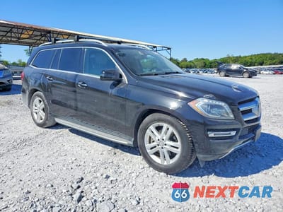 Czwarte zdjęcie samochodu z boku: 2014 MERCEDES-BENZ GL 350 BLUETEC VIN:4JGDF2EE2EA330512 - miniatura