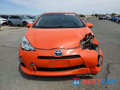 Piąte zdjęcie samochodu w środku: 2014 TOYOTA PRIUS C ONE VIN:JTDKDTB36E1069394 - miniatura