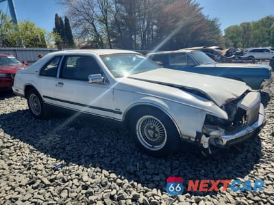 Czwarte zdjęcie samochodu z boku: 1988 LINCOLN MARK VII LSC VIN:1LNBM93E7JY613904 - miniatura