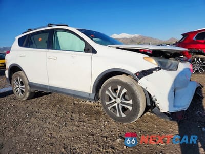 Czwarte zdjęcie samochodu z boku: 2017 TOYOTA RAV4 LE VIN:2T3BFREV2HW568077 - miniatura