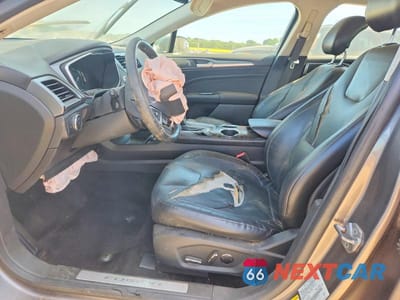 Zdjęcie 7 z 13 samochodu: 2013 FORD FUSION TITANIUM VIN:3FA6P0K99DR258918 - miniatura